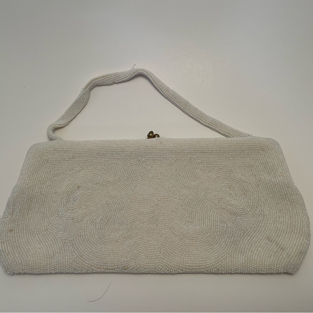 Beaded clutch made in Belgium for Neiman Marcus